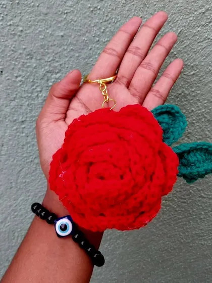A beautiful red rose keychain. It's like carrying a tiny, everlasting flower with you everywhere you go.