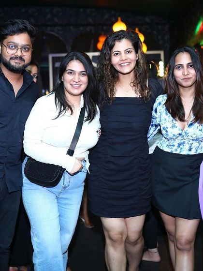Friends enjoying the vibe at Badmaash on a Saturday night.