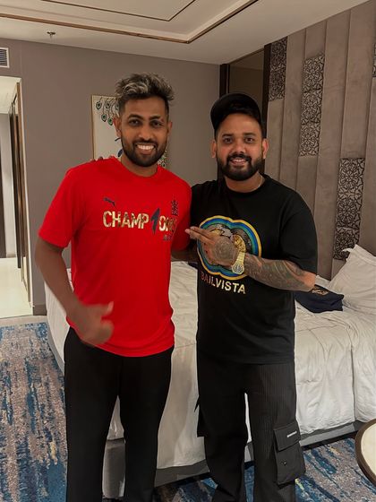 Another shot with IPL champion Nuwan Thushara, celebrating his team's victory.