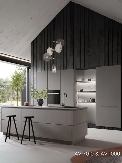 This kitchen features a sleek, minimalist design with grey concrete and greige laminate fronts, set against a dramatic dark wood-paneled wall.