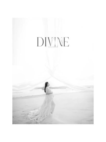 The black and white version of the "DIVINE" portrait, this image emphasizes the form, texture, and a timeless, classic feel.