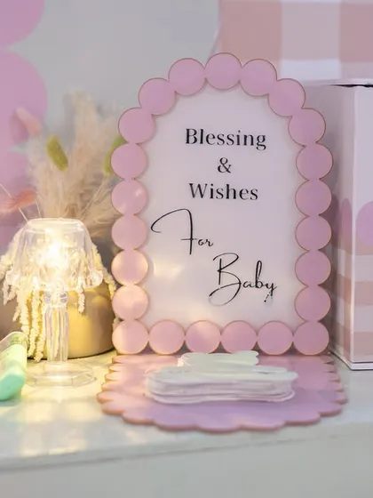 A "Blessing & Wishes for Baby" station, where guests could write heartfelt messages for the baby.