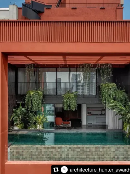 Our designs seamlessly blend recreation with nature. Here, a rooftop pool is framed by hanging and potted plants, creating a tranquil escape where the water reflects the sky and the greenery provides a sense of privacy and serenity.