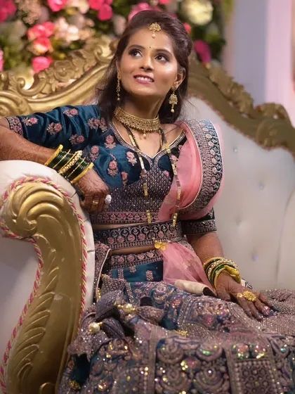 The bride looking up, a candid shot that captures a moment of thought and happiness during her reception.