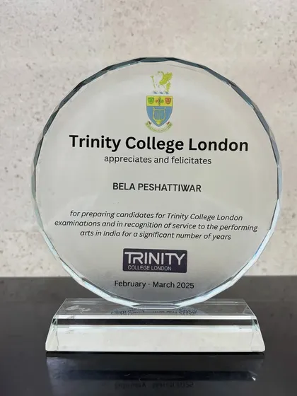 A close-up of the award from Trinity College London, recognizing our founder's significant service to the performing arts in India. We are incredibly proud of this achievement.
