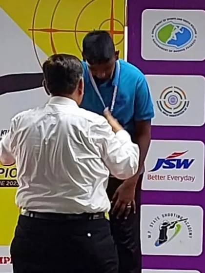 Jonathan receiving his silver medal on the podium at the KSS Competition.