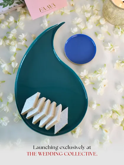 Launching exclusively at The Wedding Collective, this image features our paisley-shaped tray from the 'Symbols of Celebration' collection. Its elegant form is perfect for serving sweets or as a memorable wedding keepsake.