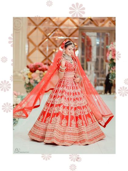 The flow of the lehenga and the veil is just as important as the makeup. This shot captures the entire bridal ensemble beautifully.