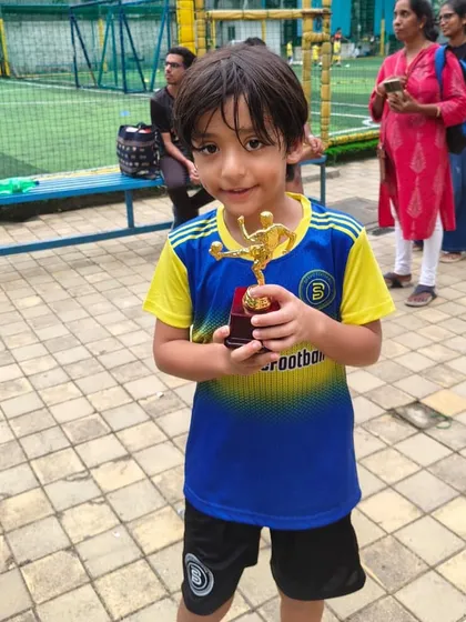 A proud moment for one of our U8 players, holding his trophy high. We celebrate every individual achievement as a collective win for the Bravo family.