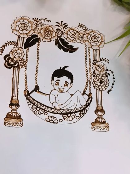 The completed baby shower motif, with a smiling baby in a beautifully decorated swing. I teach how to create these custom figures for clients.