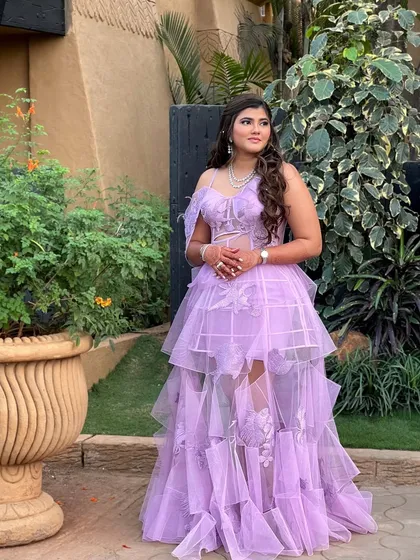 Kajol looking stunning in her tiered lilac gown. The makeup is soft and pretty, letting the unique dress be the main focus.