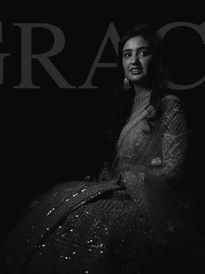 A graceful black and white portrait that captures the timeless elegance of the bride.