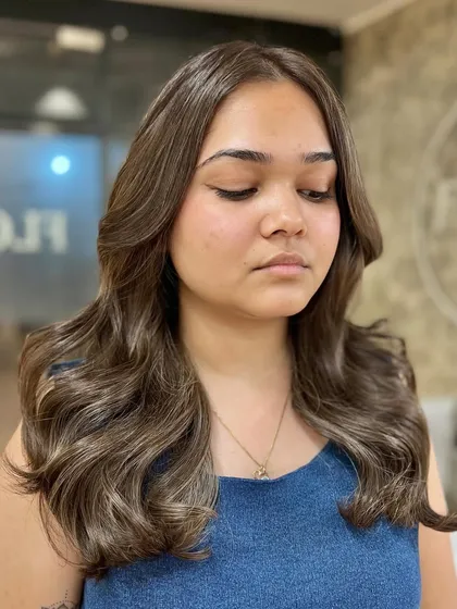 Ash brown is a great option for a cooler-toned brown. It's sophisticated and modern, and the waves add beautiful texture.