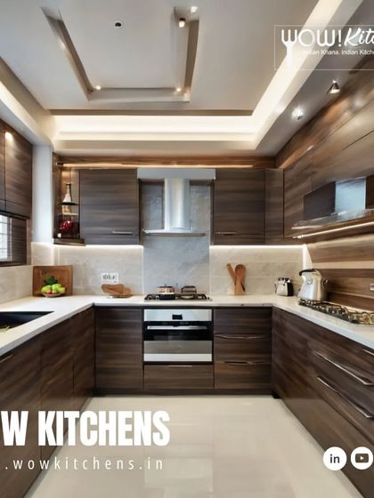 A fully wood-paneled U-shaped kitchen that exudes warmth and sophistication. The consistent wood grain across all cabinets, paired with a white countertop and integrated appliances, creates a seamless and high-end rustic look.