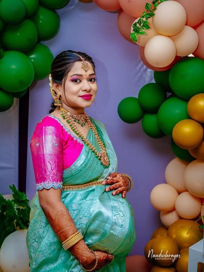 A duplicate of 141, this close-up shows the intricate details of her makeup, jewelry, and the joy in her eyes.