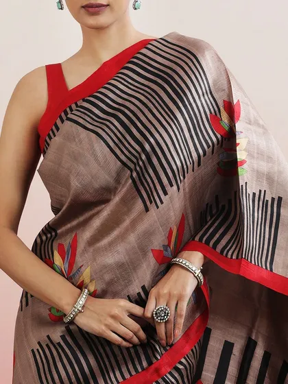 Another close-up, showing the contrast between the bold black stripes and the delicate floral print.