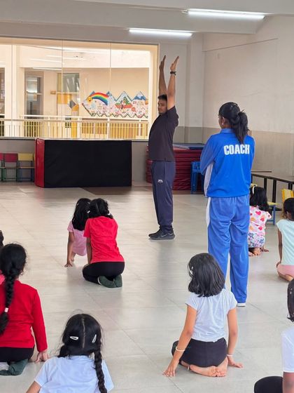 Leading by example is a core part of my teaching. I often demonstrate the correct posture and form alongside my assistant coaches to give students a clear visual guide.