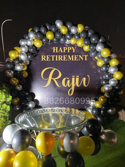 Another view of the complete retirement party setup on an outdoor terrace. I can adapt these designs for both indoor and outdoor corporate venues.