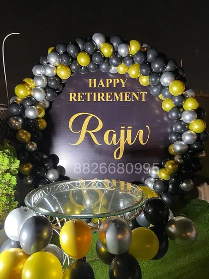 Another view of the complete retirement party setup on an outdoor terrace. I can adapt these designs for both indoor and outdoor corporate venues.