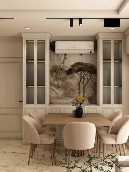 A different perspective of the dining space, highlighting the clean lines of the furniture and the effective use of track lighting to create a warm and focused dining environment.