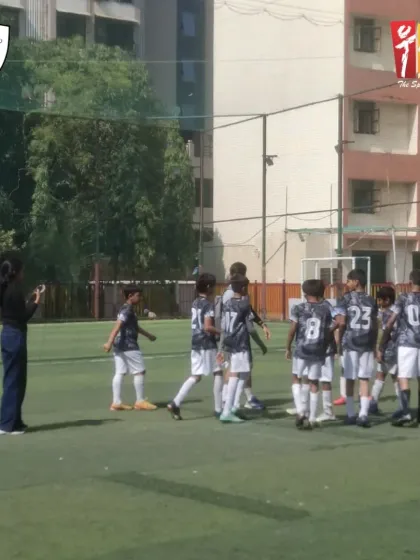 A great start to the campaign for our TSG Football School team. Here, our coach gives a team talk during a 2-1 victory, highlighting our focus on strategy and teamwork from a young age.