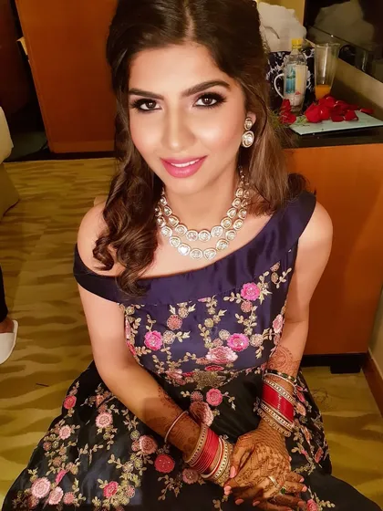 A lovely portrait of this client ready for an engagement party. The soft smokey eye and defined brows frame her face beautifully, while her skin has a luminous finish.