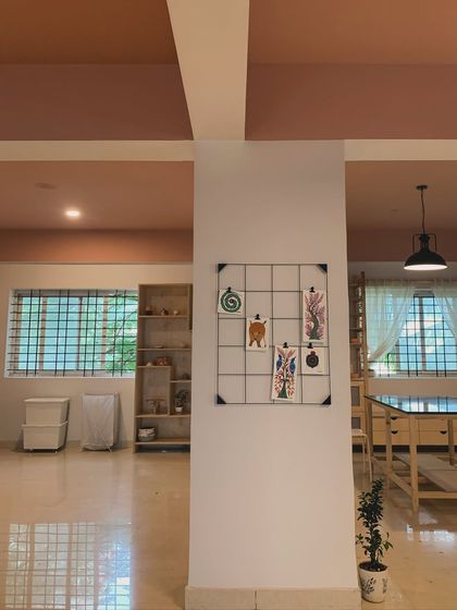 We love adding personal touches, like this art grid, to make the space feel like a gallery of inspiration. It’s a reminder of the diverse creativity that our community brings to the studio every day.