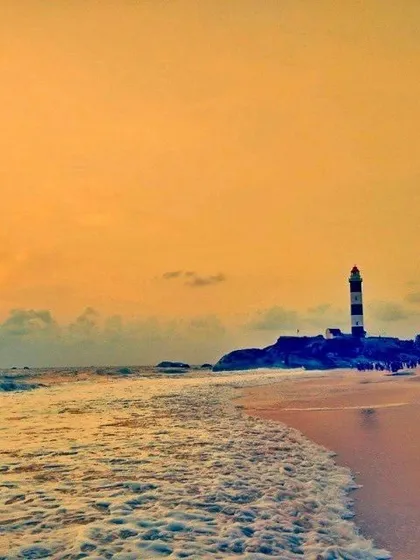 The beautiful Kapu Beach at sunset, with its iconic lighthouse.