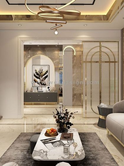 This living room view shows the seamless transition from the foyer, with arched doorways and a consistent palette of gold, marble, and rich textures.