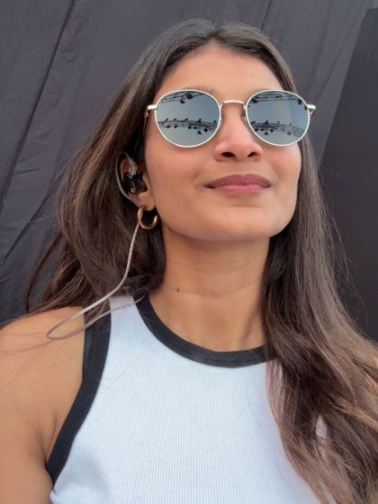 A quick selfie during soundcheck, wearing my in-ear monitors. This is a crucial part of preparing for a professional live show.