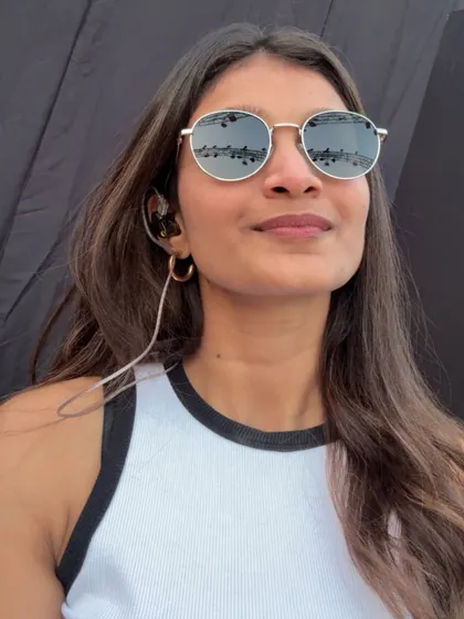 A quick selfie during soundcheck, wearing my in-ear monitors. This is a crucial part of preparing for a professional live show.