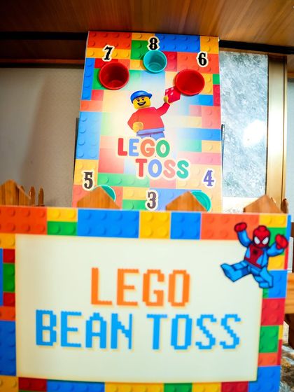 A closer look at the colorful "Lego Bean Toss" game board.