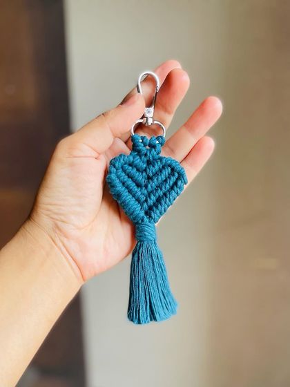 This teal heart keychain is a beautiful and unique color. It's perfect for corporate gifting or wedding favors.
