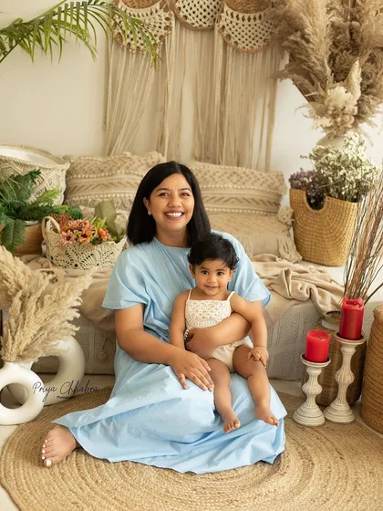 A full view of our beautiful boho studio setup for a milestone session. This mother and daughter portrait is warm, earthy, and full of love.