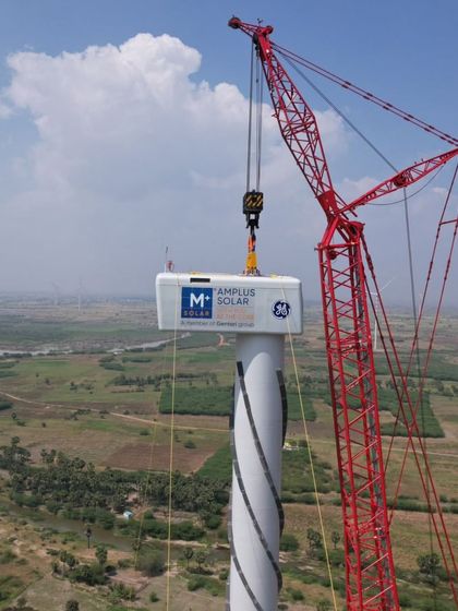 The nacelle for a wind turbine being carefully lifted into place at our Project Shiva site. We manage the complex logistics and precision engineering required to construct these large-scale hybrid projects, ensuring the highest standards of quality and safety.