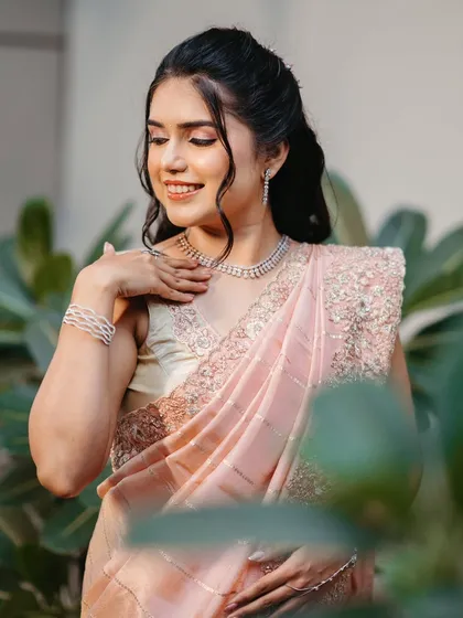 A close-up on the soft, shimmery makeup. The bride is glowing, and her diamond jewellery adds a touch of sparkle.