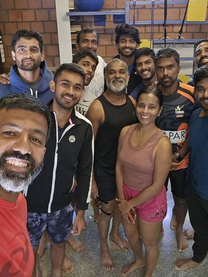 A group selfie after a rewarding workshop with the "Doubles Dream of India" team. The sense of community and shared effort is a powerful part of the yoga journey, even for elite athletes.