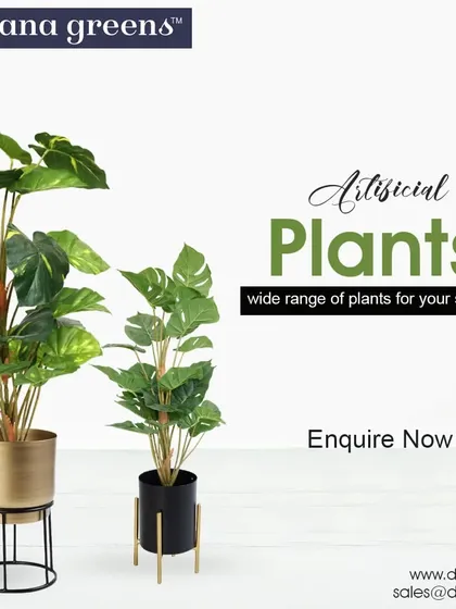 We offer a wide range of artificial plants for your space. These two Monstera-style plants are shown in stylish metallic planters with stands, perfect for a modern home.