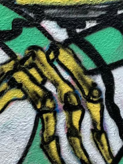 A detail shot of the robot's skeletal, mechanical hand. I enjoy adding these small, intricate details to my character designs.