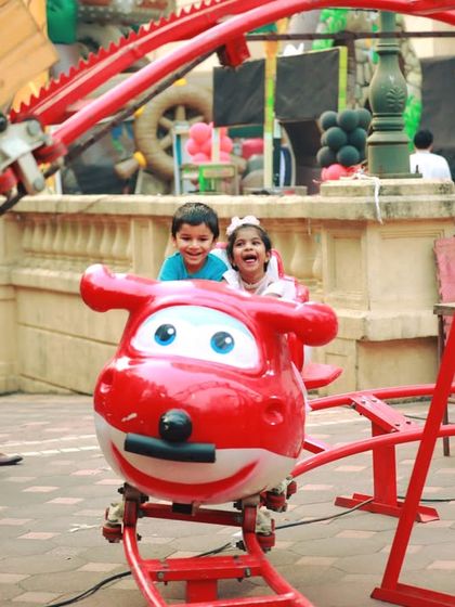 All aboard the fun express! This airplane-themed roller coaster ride is perfect for younger children, providing gentle thrills and lots of smiles.