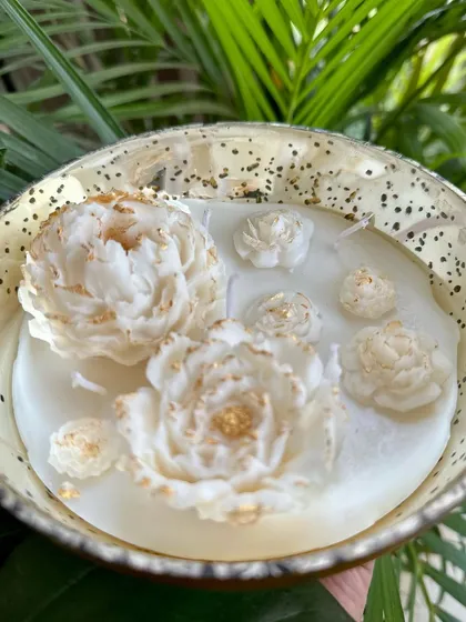 Another angle of the peony bowl candle, showing the delicate, hand-painted details on the wax flowers.