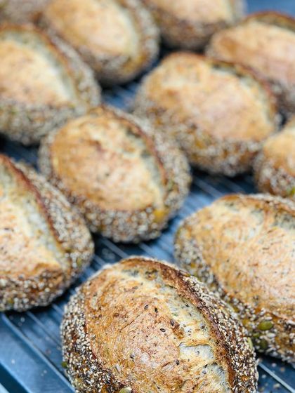 Our artisanal seeded breads, fresh out of the oven. These loaves are perfect for making sandwiches or enjoying on their own with our house-made dips.