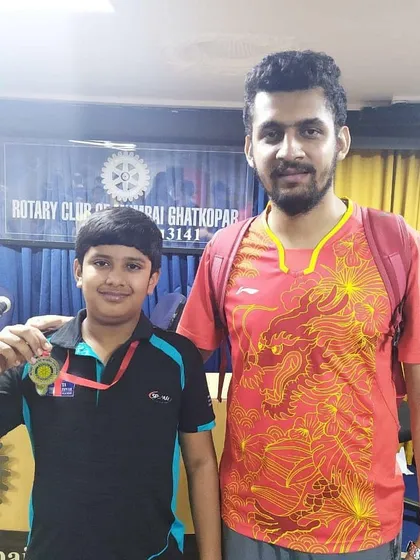 A close-up shot of our coach with Ansh Karnavar, the winner of the Cadet Boys event at the Rotary tournament.