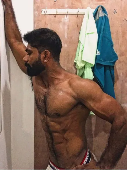 A side shot showing my oblique and chest definition.
