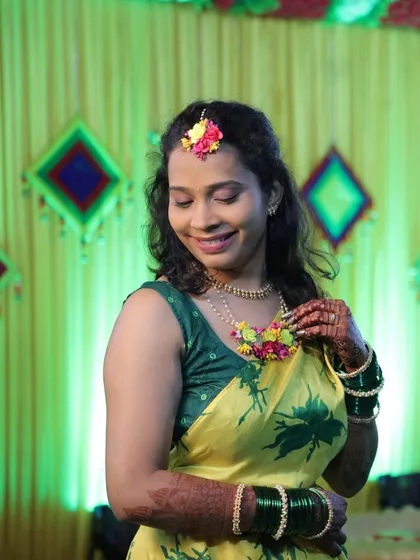 A beautiful photo of a bride during her haldi ceremony, with my mehendi adding to her glow.
