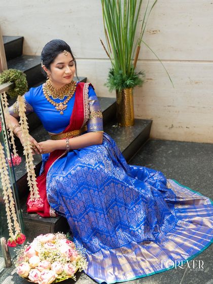 A beautiful composition for a bangle ceremony, with the client dressed in a traditional Telugu half saree.