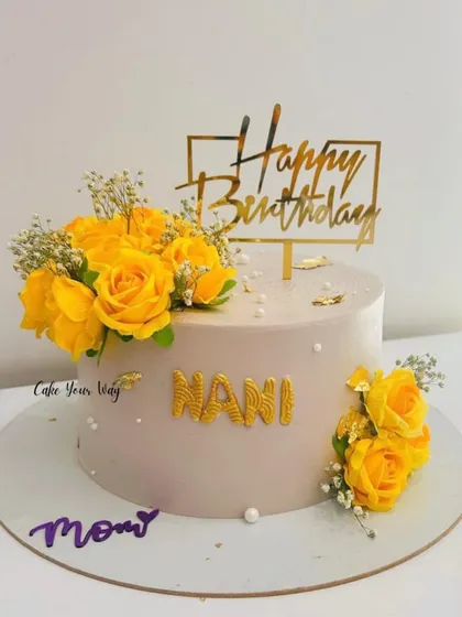 Simplicity and elegance for Nani and Mom, with beautiful yellow roses and a golden topper.