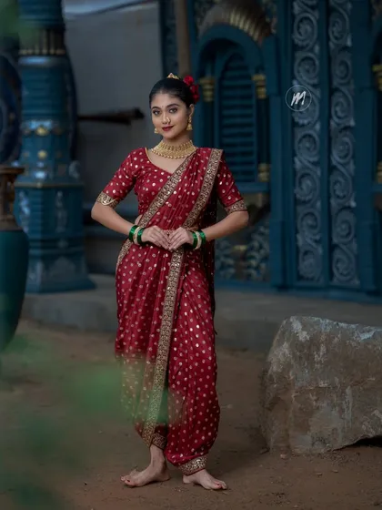 Another angle of the beautiful Nauvari drape, showing the pleats and fall of the saree.