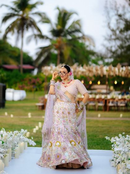 A fun and quirky shot of Tithi on the aisle. Her personality shines through, and her makeup is fresh and radiant.