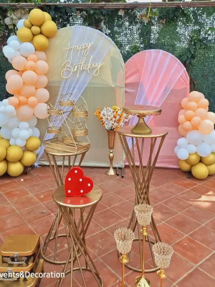 The full view of the elegant outdoor birthday setup, perfect for a daytime celebration or garden party.